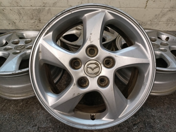 Oryginał felgi 15cali Mazda 3 5 Axela MPV Premacy KIA Mitsubishi
